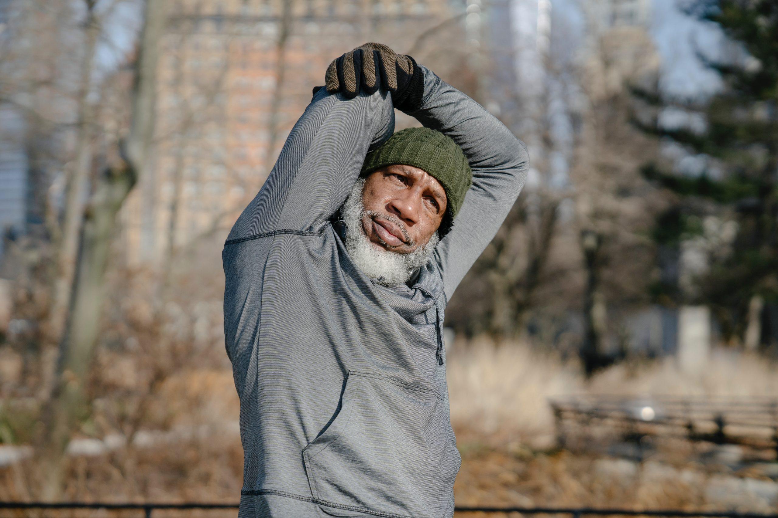 Man stretching in winter