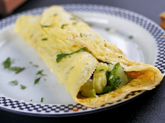 Omelette Stuffed with Goat Cheese, Summer Squash and Parsley