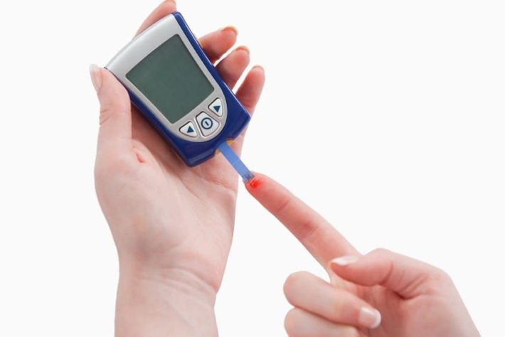 blood sugar check pricked finger